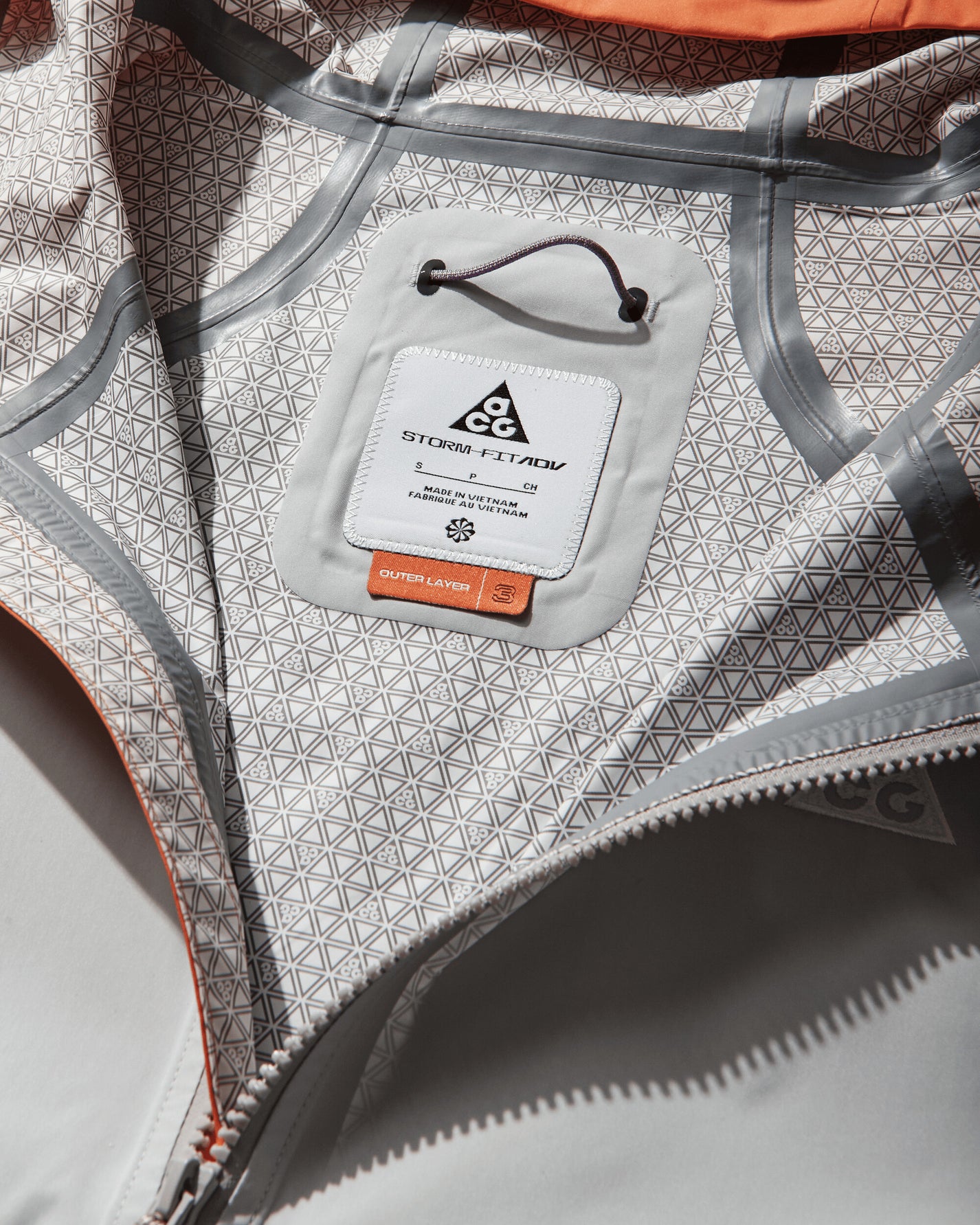 Nike W Acg Sfadv Phantazma Jkt Safety Orange/Grey Fog/Summit  Coats and Jackets Jackets IF0101-819