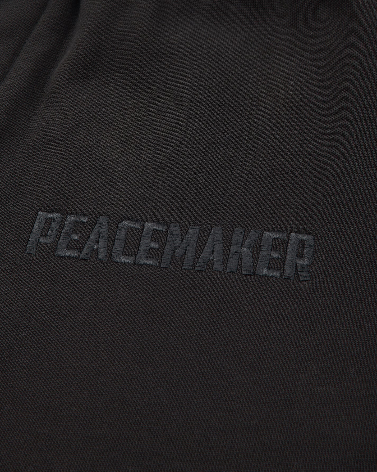 OAMC Peacemaker Loose Fit Sweatpants Peacemaker Logo Black Pants Sweatpants PCM2OW01PFT00299 99
