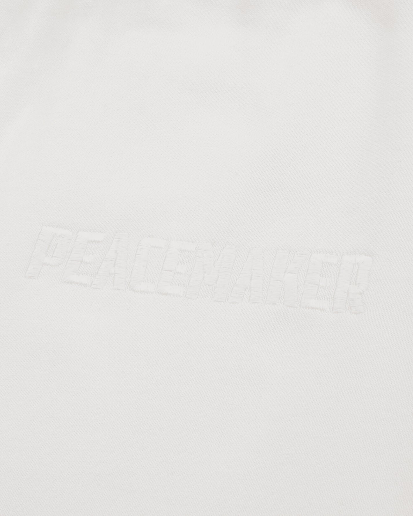 OAMC Peacemaker Loose Fit Sweatpants Peacemaker Logo White Pants Sweatpants PCM2OW01PFT00201 01