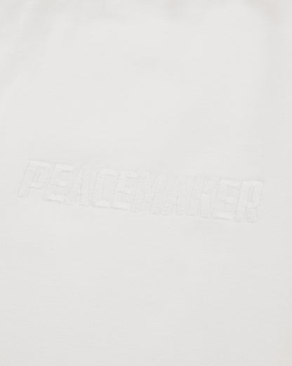 OAMC Peacemaker Loose Fit Sweatpants Peacemaker Logo White Pants Sweatpants PCM2OW01PFT00201 01