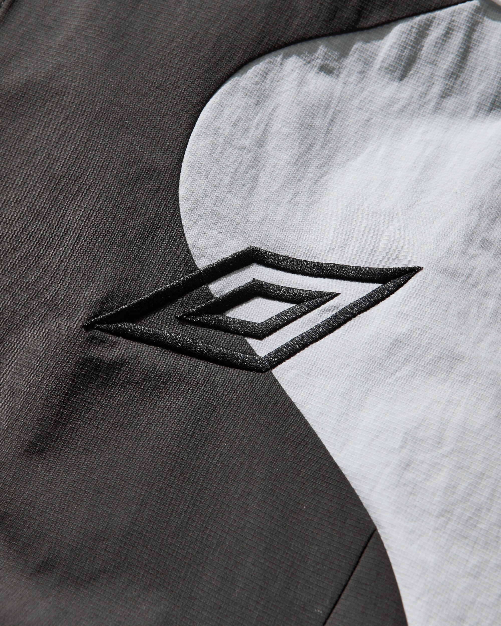 Umbro Guarding Masked Tracksuit White Dark Olive Coats and Jackets Jackets UBMW0477FA307 WTH0007